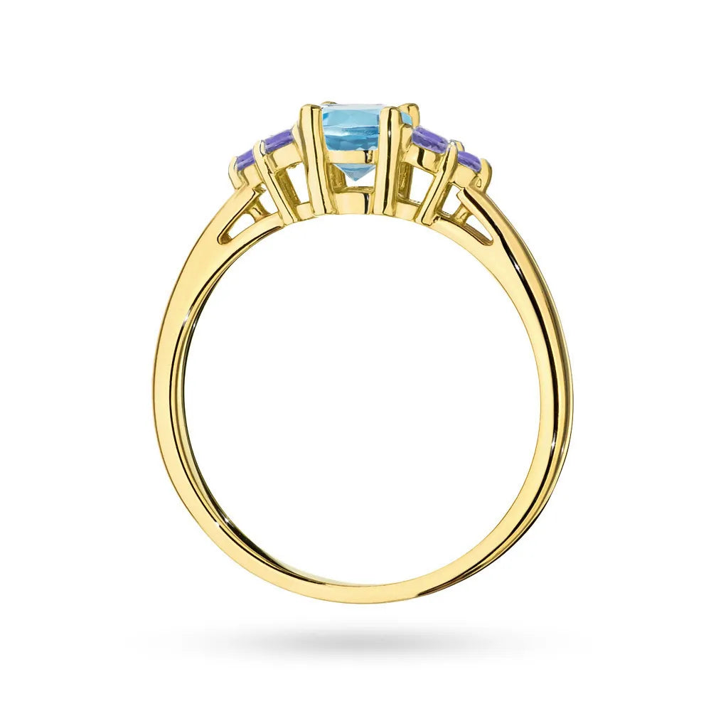 Gold 14k(585) ring with 0,50ct topaz with 6 tansanites. Perfect for a gift.