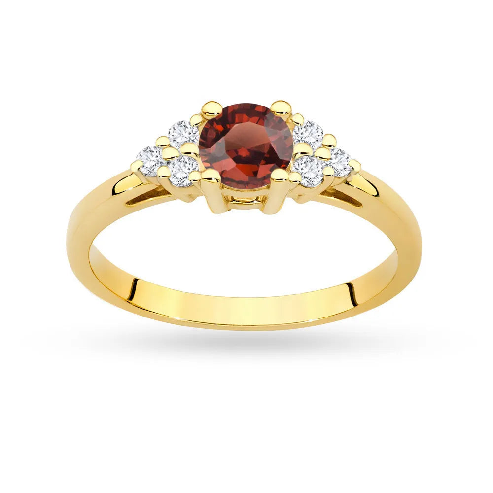 Gold 14k(585) ring with 0,60ct garnet with 6 diamonds. Perfect for a gift.