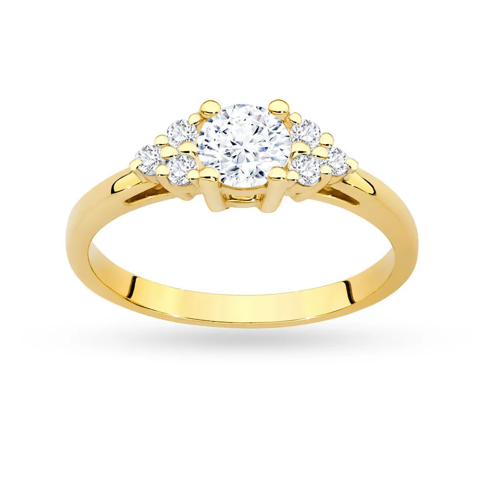 Prsten ze žlutého zlata 14k (585) s bílým safírem o hmotnosti 0,60 ct a šesti diamanty. Skvělý jako dárek.