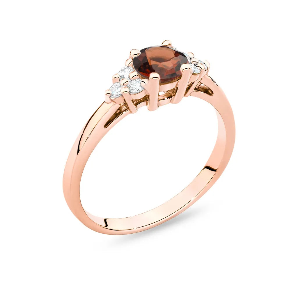 Rose Gold 14k(585) ring with 0,60ct garnet with 6 diamonds. Perfect for a gift.