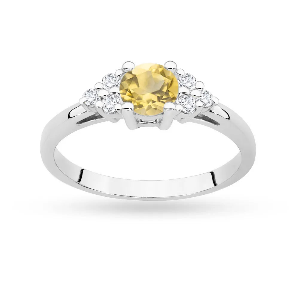 Prsten z bílého zlata 14k (585) s citrínem 0,50 ct a 6 diamanty. Skvělý jako dárek.
