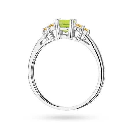 White Gold 14k(585) ring with 0,60ct olivine with 6 bronze diamonds. Perfect for a gift.