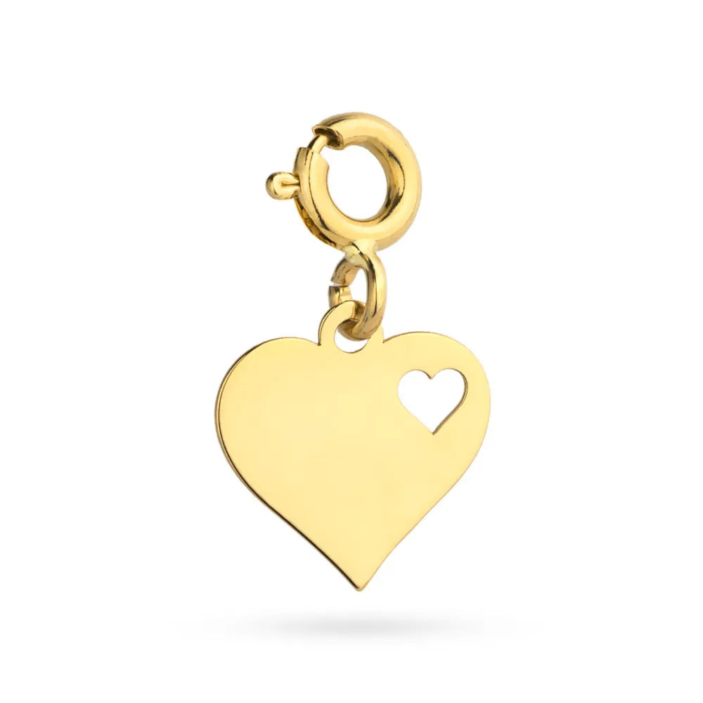 Gold heart-shaped pendant with a cutout design on a white background
