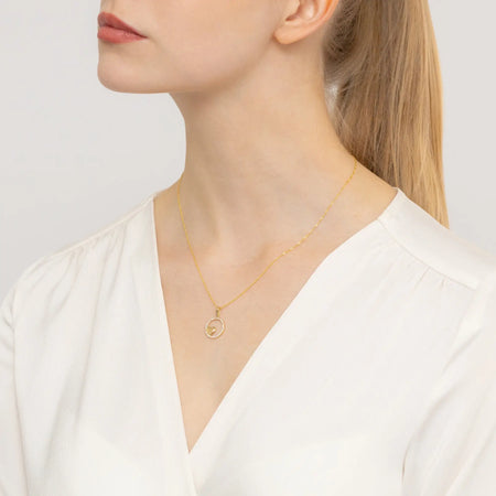 Exquisite gold pendant made from luminous 585 gold. Its warm golden tone complements the clarity of the zirconia.