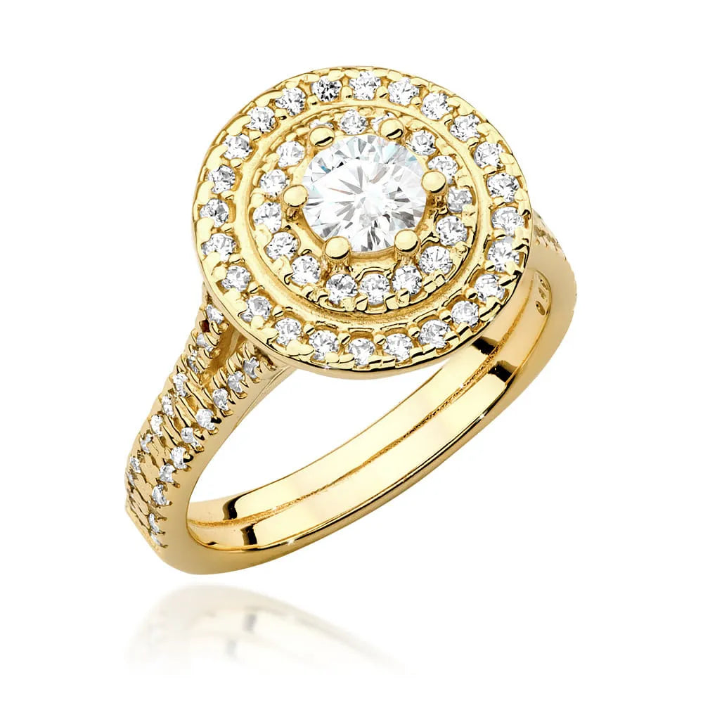 Náušnice ze zlata 14k(585) s diamantem o hmotnosti 0,40 ct a postranními diamanty o hmotnosti 0,613 ct. Balené v elegantní krabičce, která je ideální jako dárek.