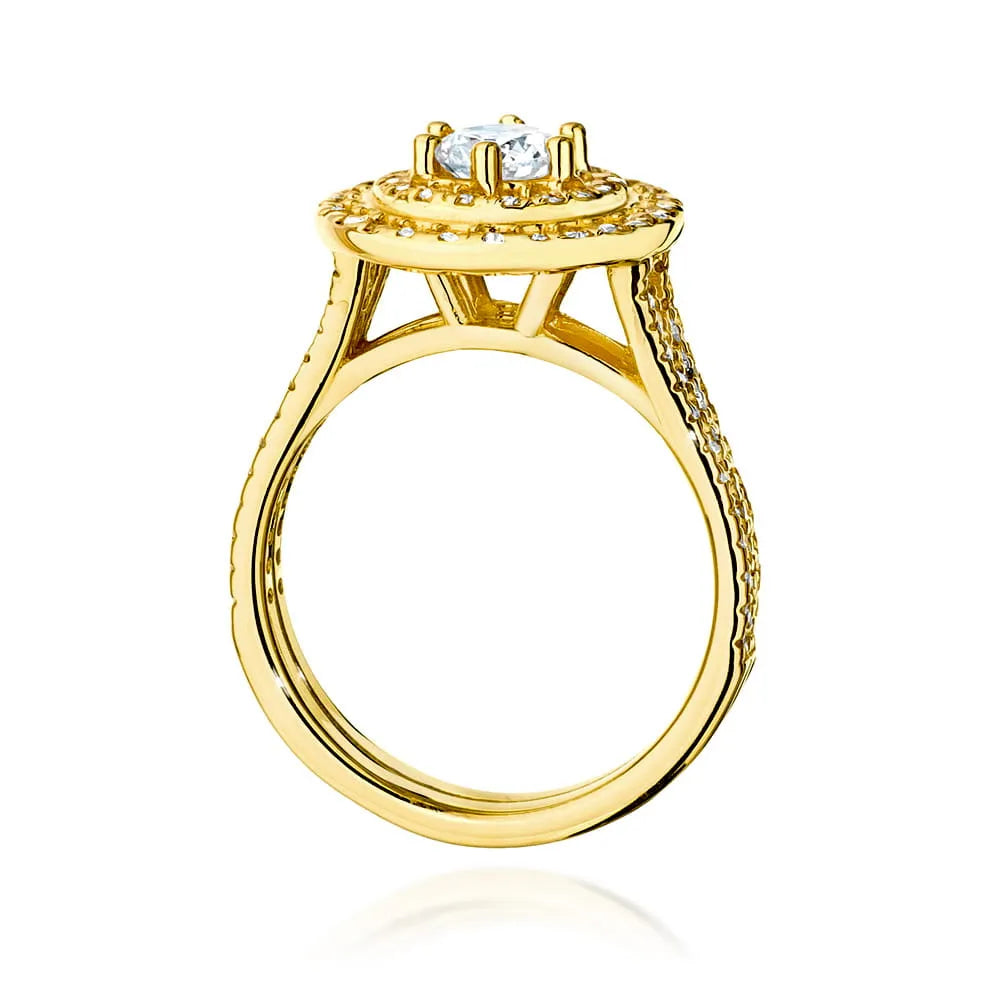 Náušnice ze zlata 14k(585) s diamantem o hmotnosti 0,40 ct a postranními diamanty o hmotnosti 0,613 ct. Balené v elegantní krabičce, která je ideální jako dárek.
