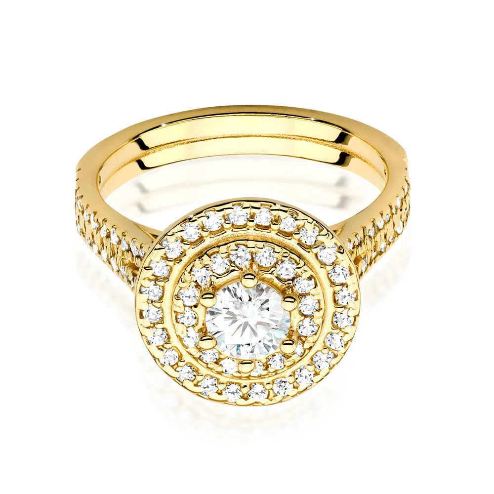 Náušnice ze zlata 14k(585) s diamantem o hmotnosti 0,40 ct a postranními diamanty o hmotnosti 0,613 ct. Balené v elegantní krabičce, která je ideální jako dárek.