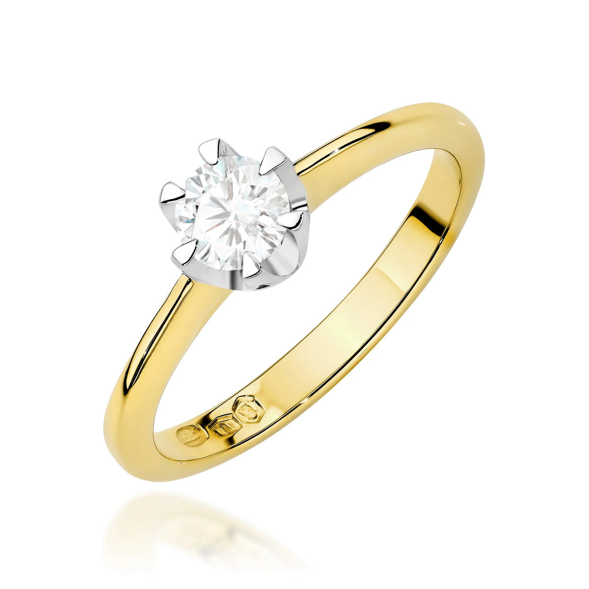 Gold 14k(585) ring with 0,50ct diamond.  Is packaged in an elegant box, which is perfect for a gift.