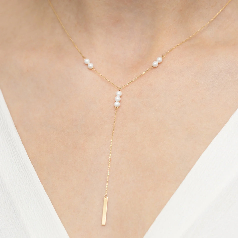 Gold 14k(585) tie necklace with pearl beads adn plate in vintage style. Order a gift for mother, girlfriend or fiancee.