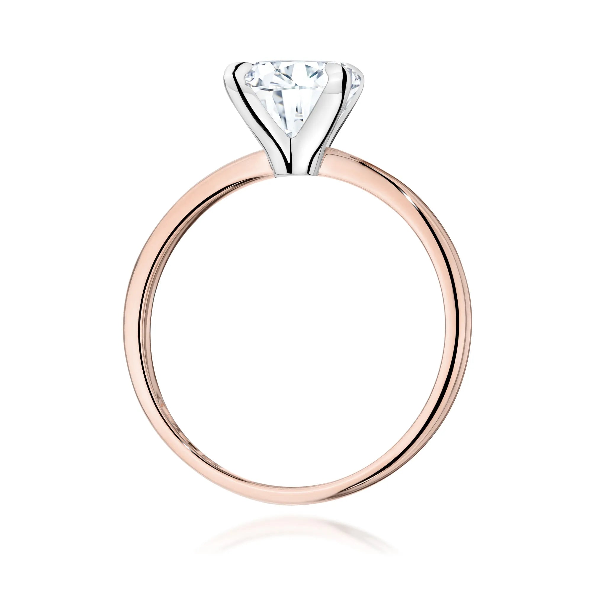 Rose Gold 14k(585) ring with 2ct lab diamond.  Is packaged in an elegant box, which is perfect for a gift.
