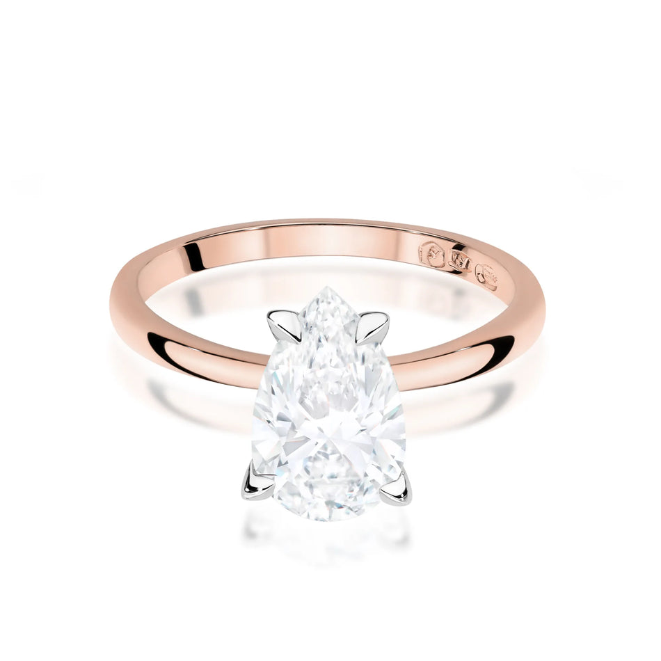 Rose Gold 14k(585) ring with 2ct lab diamond.  Is packaged in an elegant box, which is perfect for a gift.
