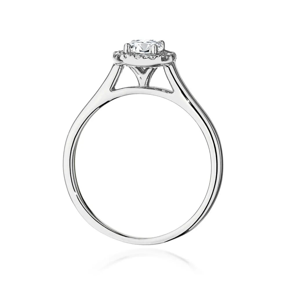Prsten z bílého zlata 14k(585) s diamantem 0,40 ct a postranními diamanty 0,12 ct. Skvělý jako dárek.