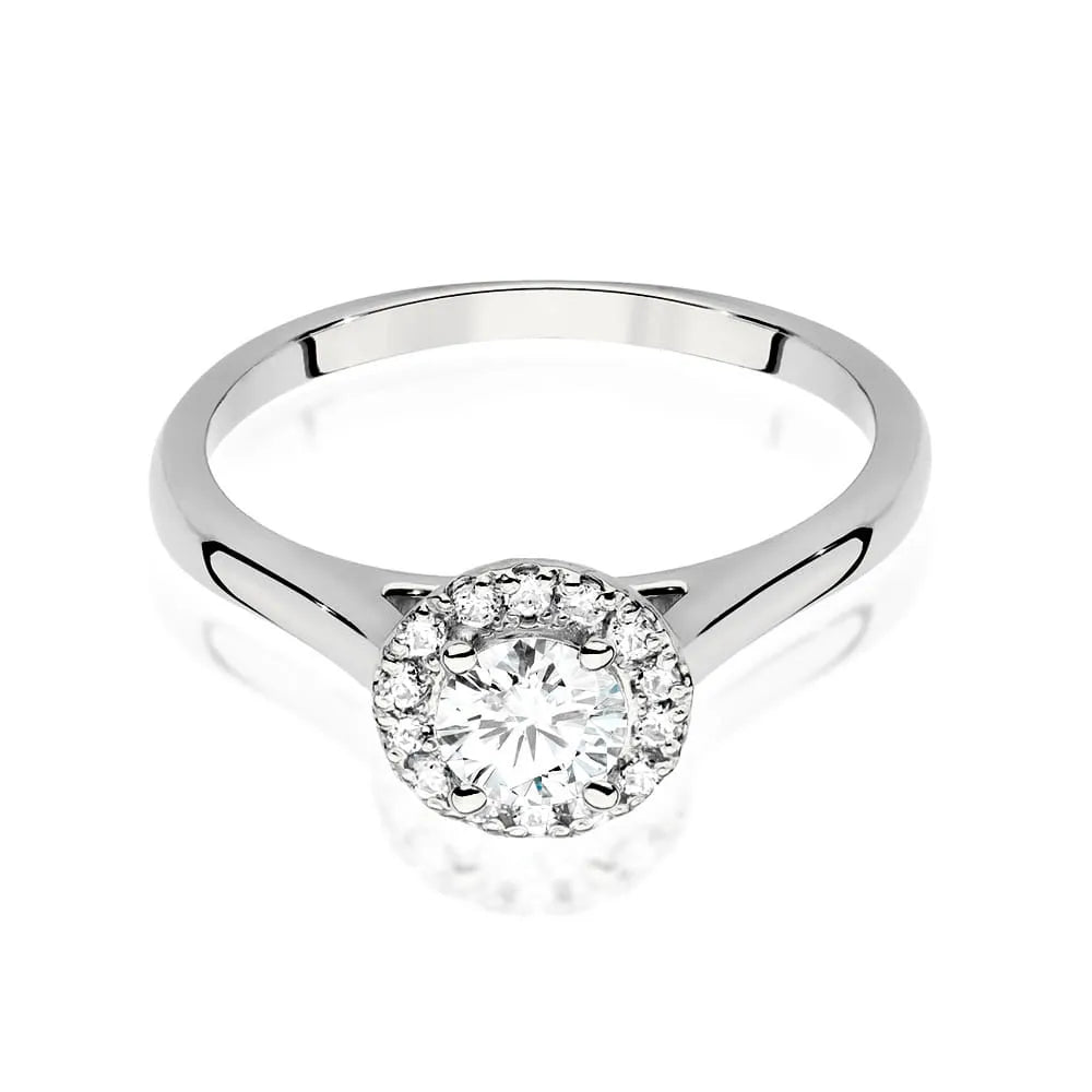 Prsten z bílého zlata 14k(585) s diamantem 0,40 ct a postranními diamanty 0,12 ct. Skvělý jako dárek.