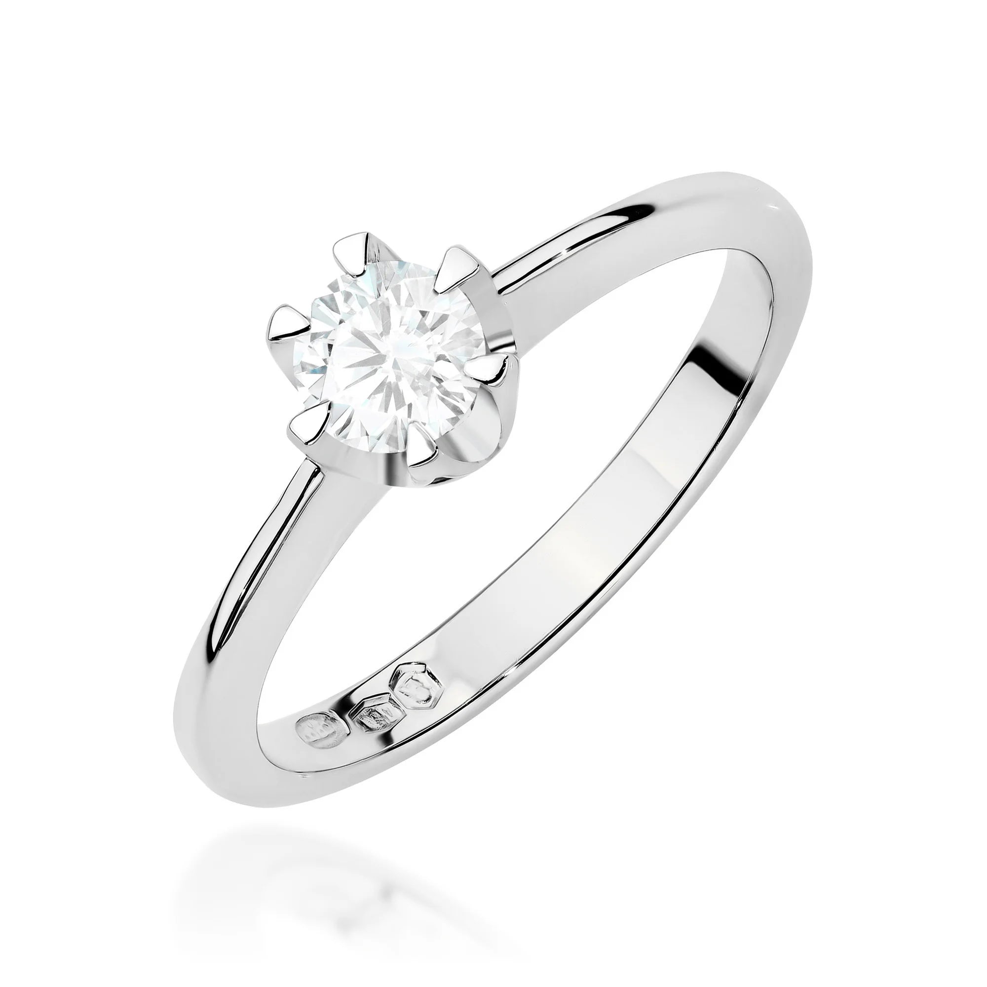 White Gold 14k(585) ring with 0,50ct diamond.  Is packaged in an elegant box, which is perfect for a gift.
