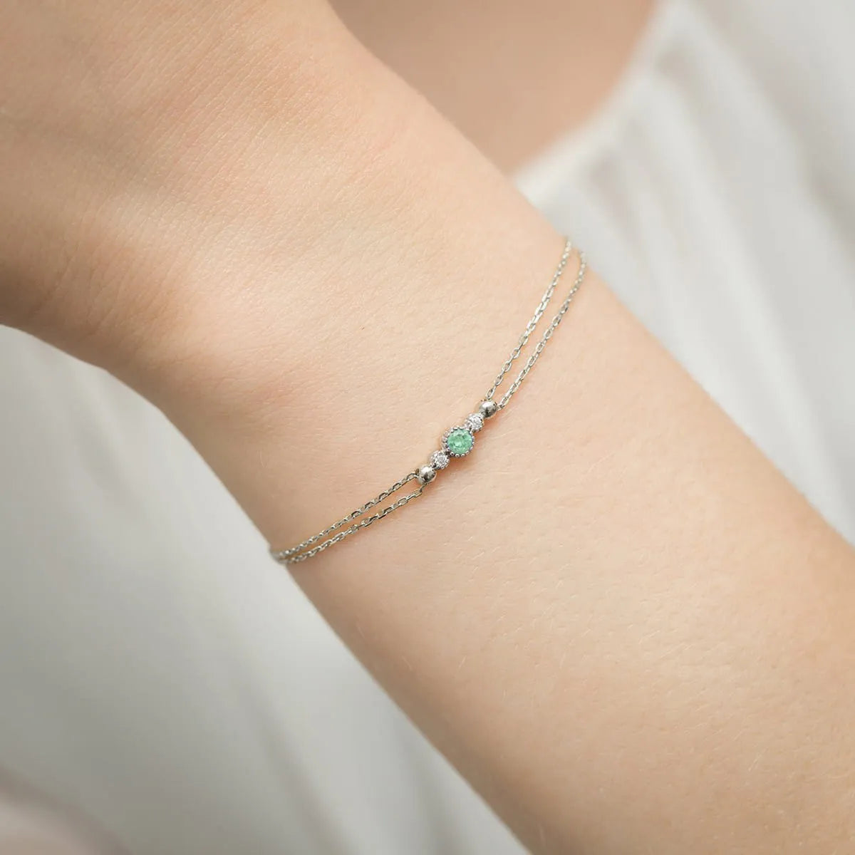 zlatý náramek s 0,15ct smaragdem a 0,029ct diamanty b0005-emg-01