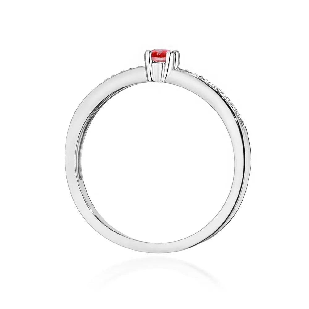 14k white gold ring with 0.15ct ruby and 0.05ct diamonds. Packed in black box, paper and gift bag.