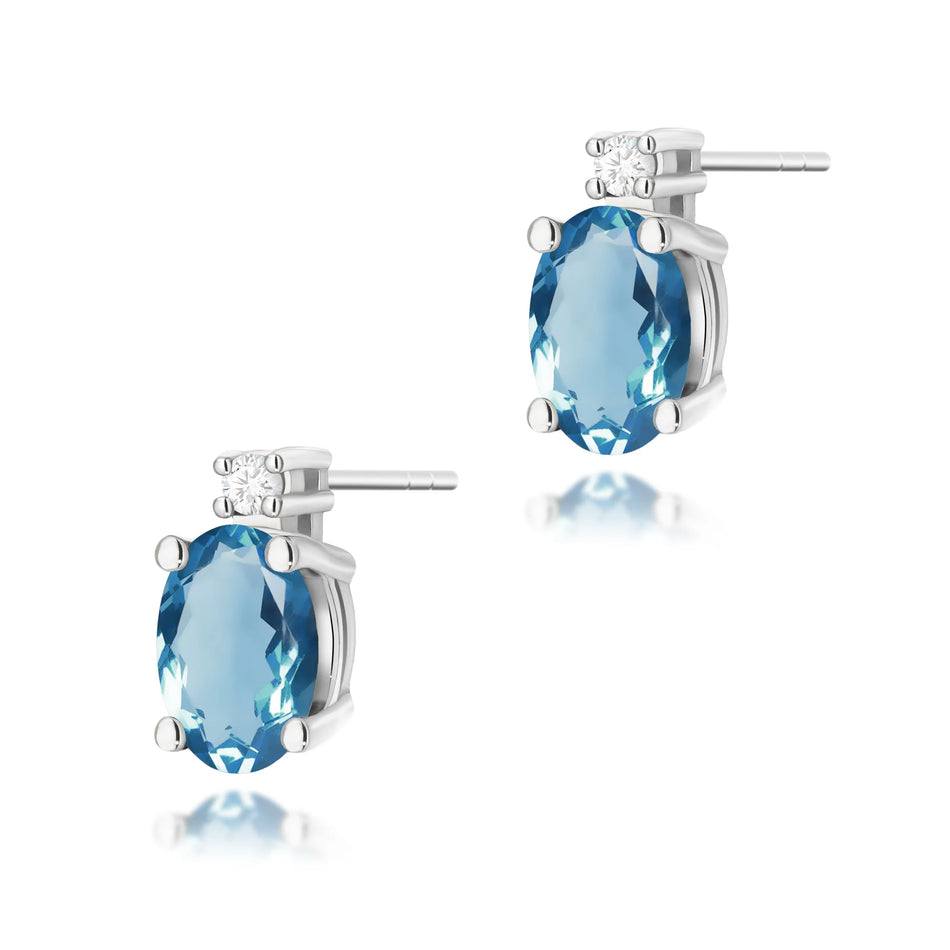 zlaté náušnice s topazem london blue 0,50 ct a diamanty 0,029 ct k0001-tol-02