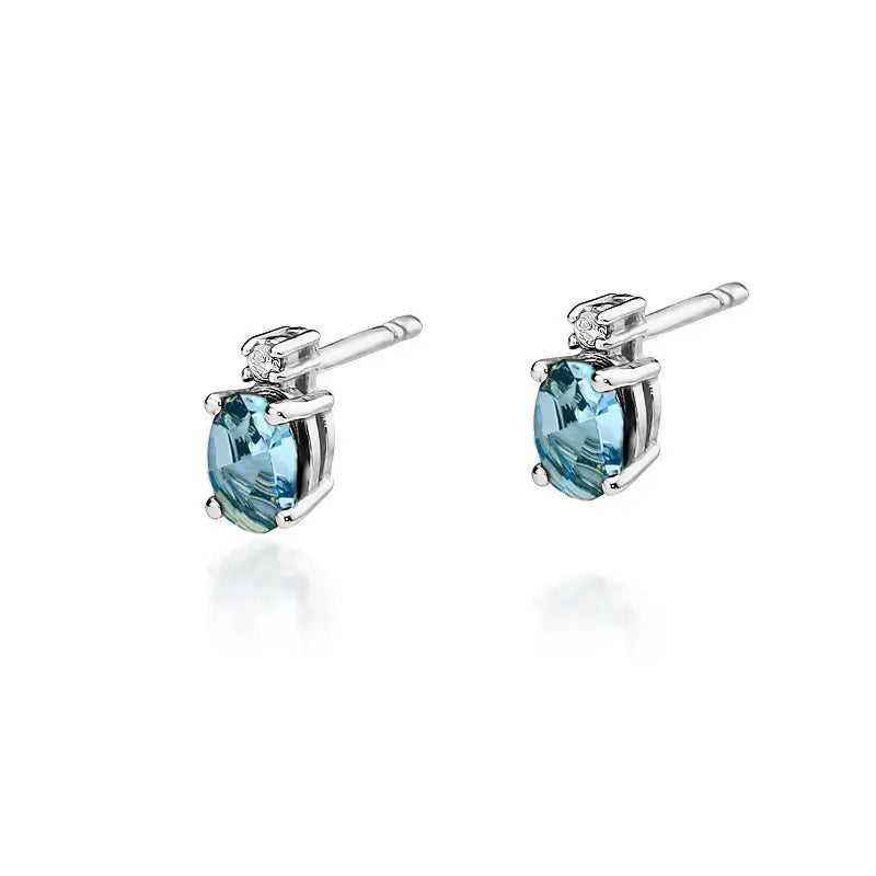 zlaté náušnice s topazem 0,50 ct a diamanty 0,029 ct k0001-tob-01