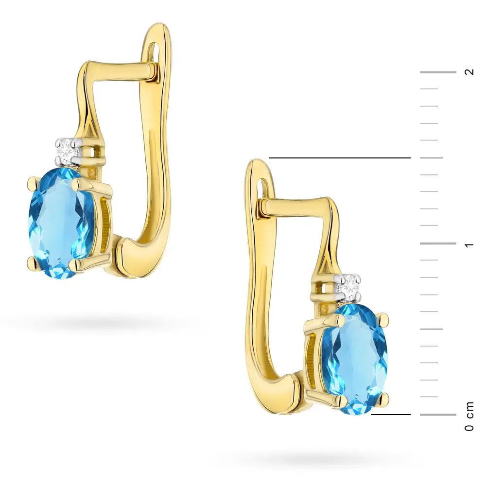 Zlaté náušnice s topazem 0,50 ct a diamanty