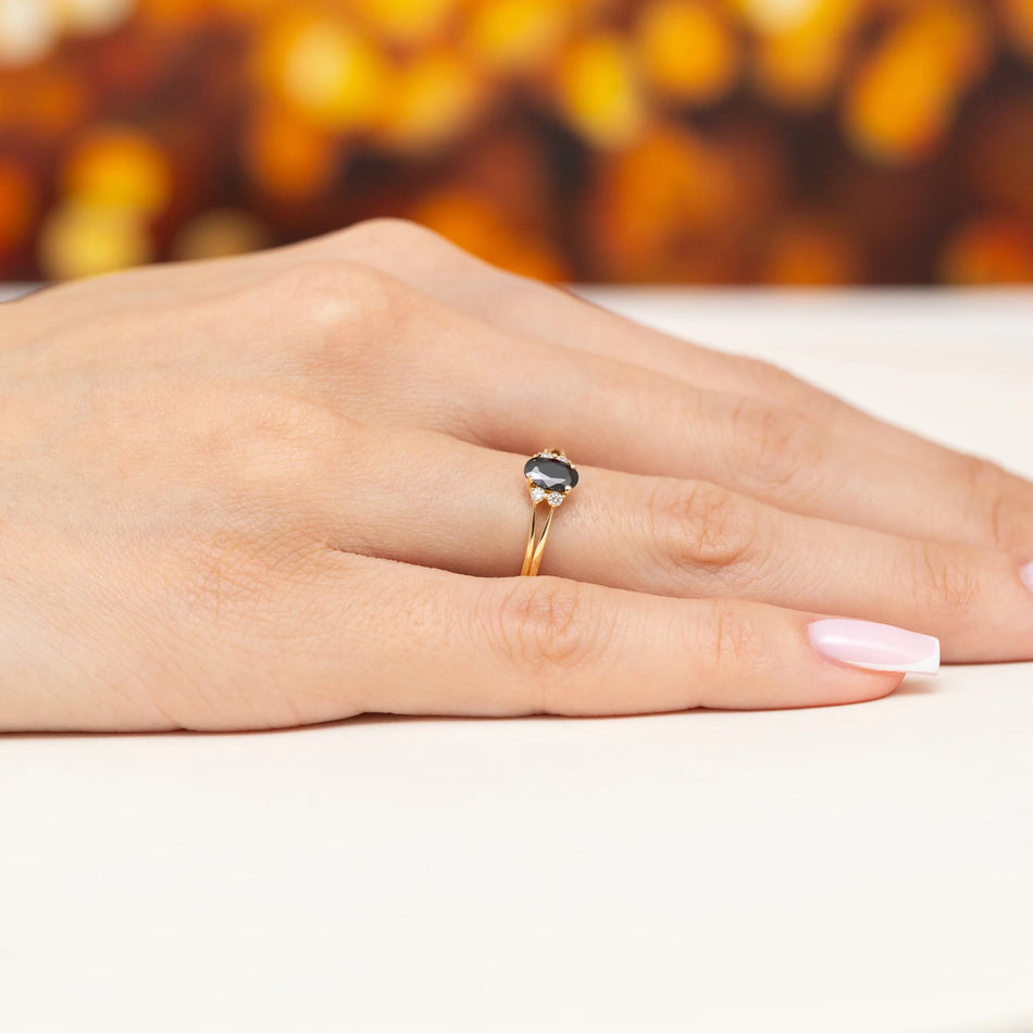 Yellow Gold Ring with Black Oval Stone and Cubic Zirconia