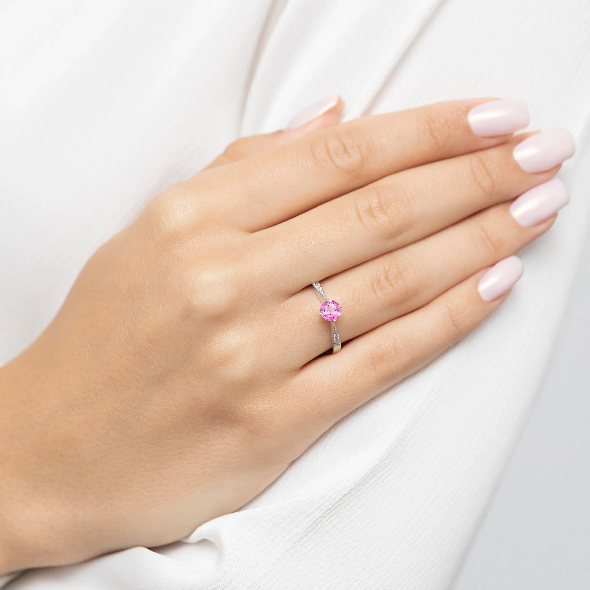 zlatý prsten s 0,50ct růžovým topazem a 0,068ct diamanty p167-585-rt0-60