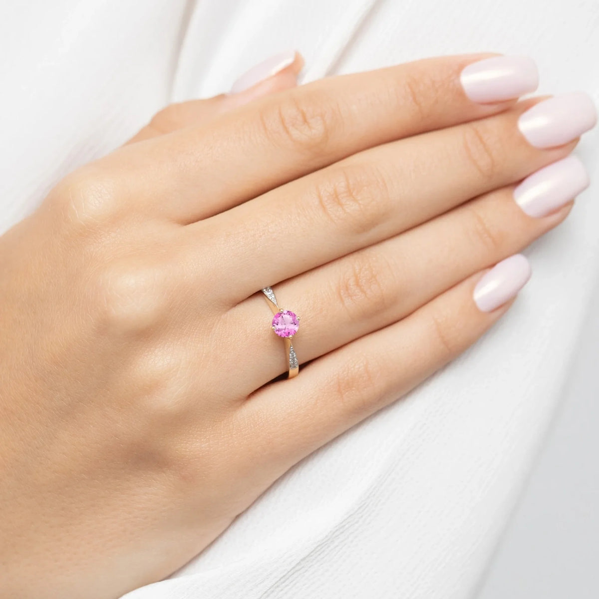 prsten-ze-zlata-s-růžovým-topazem-0-60ct-a-diamanty-0-068ct-p167-585-rt0-60