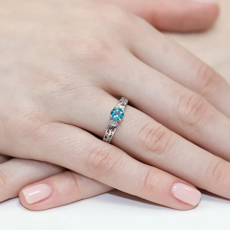 prsten-ze-zlata-s-topazem-0-50ct-a-diamanty-0-02ct-w0014-tob-01