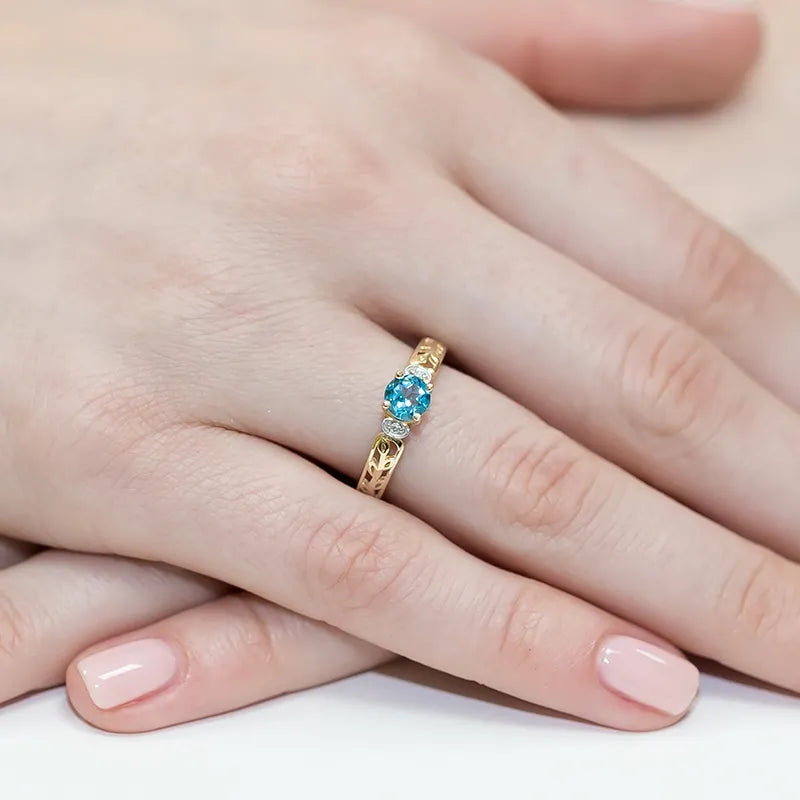 prsten-ze-zlata-s-topazem-0-50ct-a-diamanty-0-02ct-w0014-tob-01