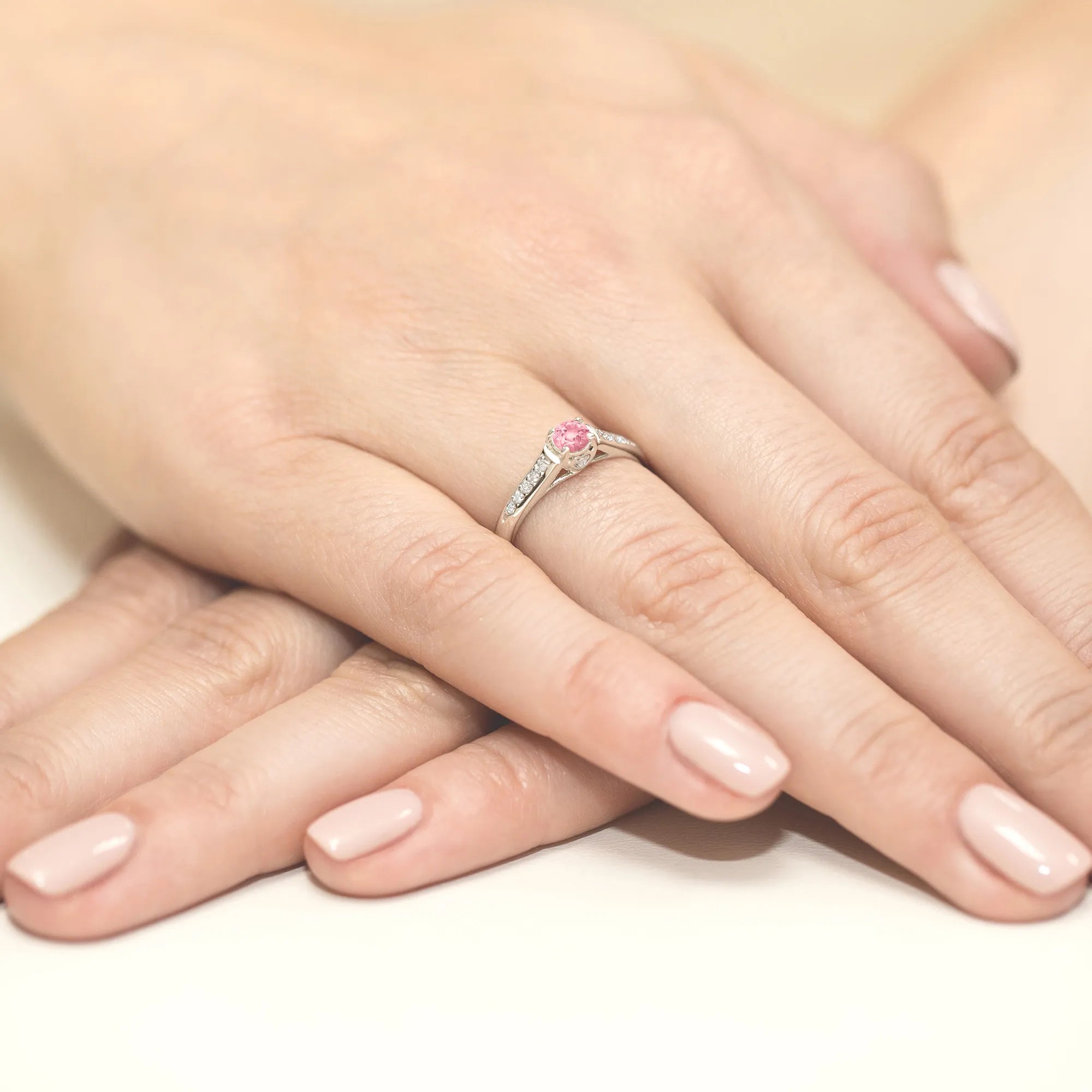 gold-ring-with-0-30ct-pink-topaz-and-0-103ct-diamonds-w0016-top-01