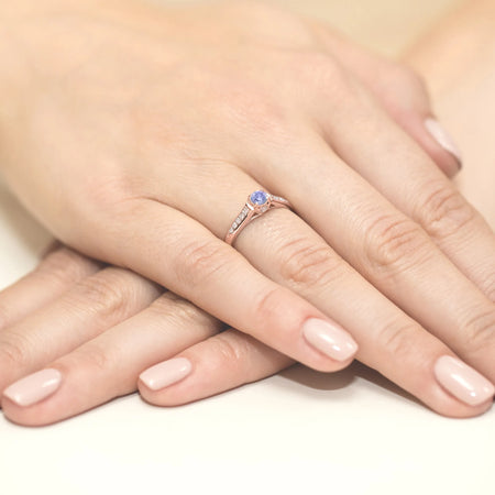 gold-ring-with-0-35ct-tansanit-and-0-103ct-diamonds-w0016-tap-01