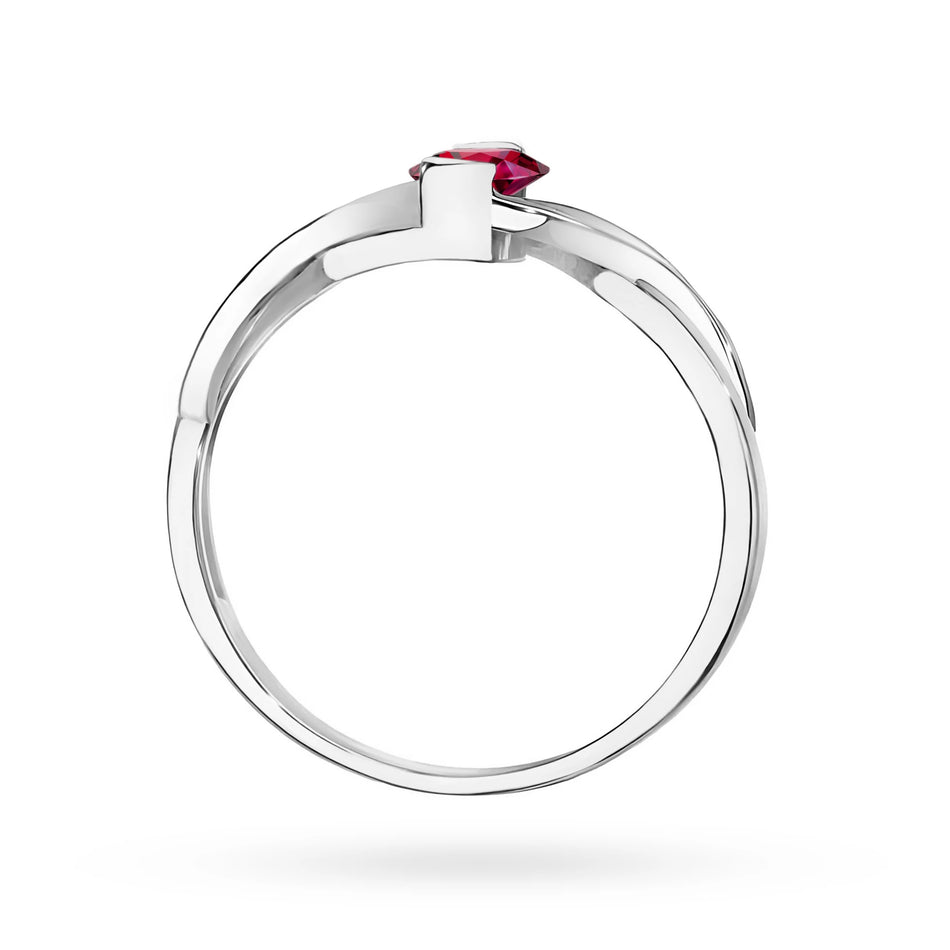 Prsten z bílého zlata s 0,60ct rubínem a 0,05ct diamanty