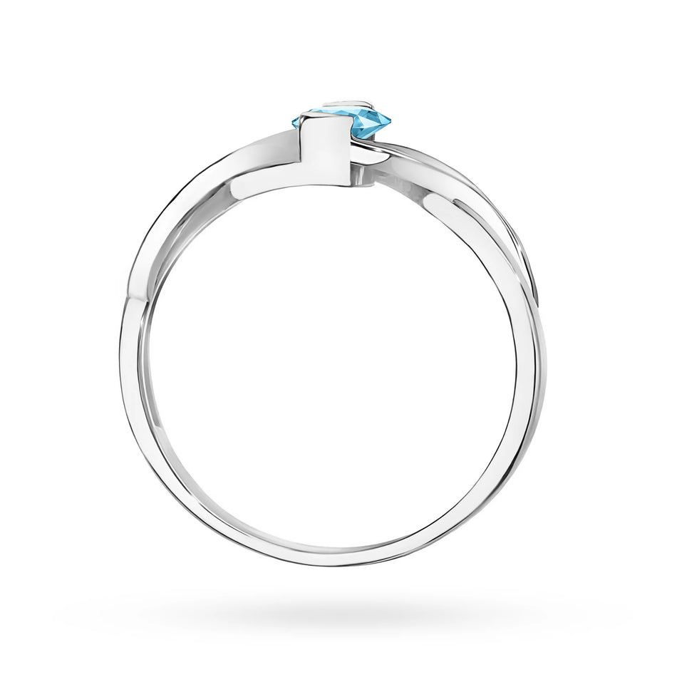 Prsten z bílého zlata s topazem 0,50 ct a diamanty 0,05 ct