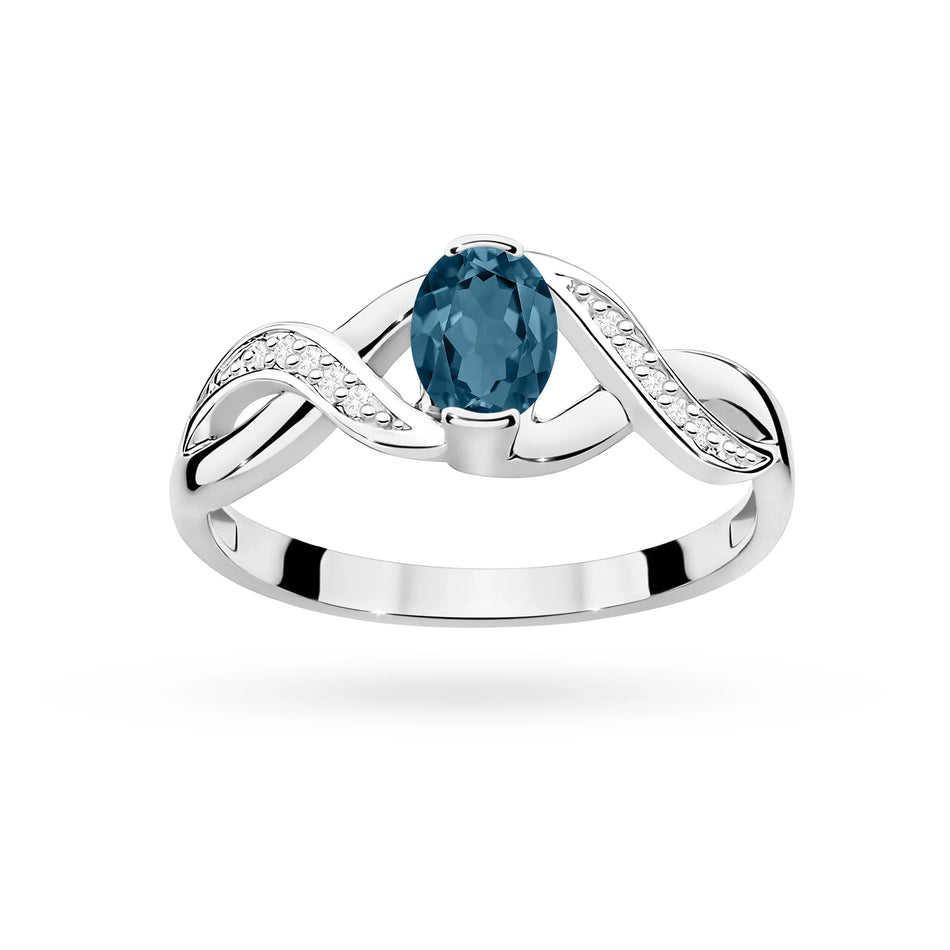 Prsten z bílého zlata s 0,50ct topazem London Blue a 0,05ct diamanty