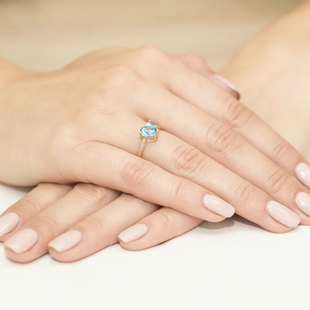 zlatý prsten s topazem 1,20 ct a diamanty 0,04 ct w0031-tob-01