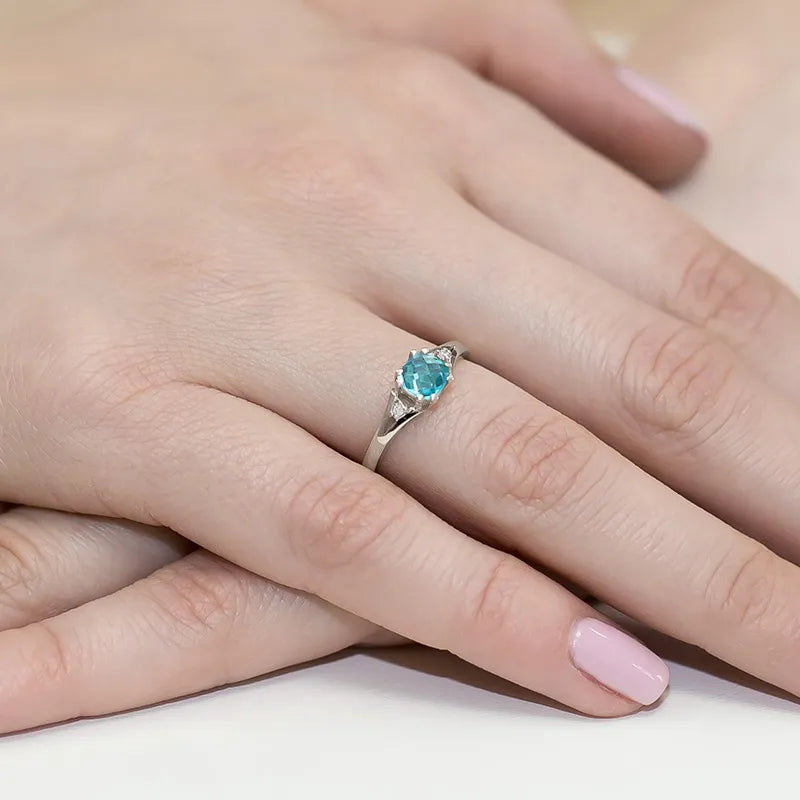 zlatý prsten s topazem 0,70 ct a diamanty 0,029 ct w0044-tob-01