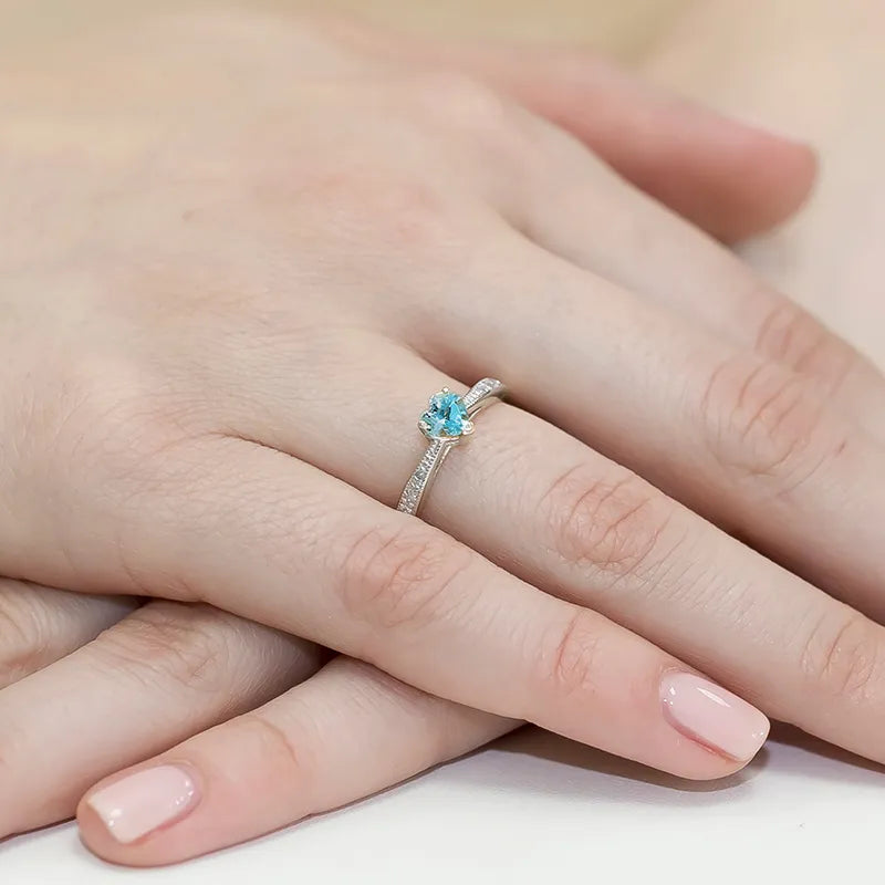 zlatý prsten s topazem 0,50 ct a diamanty 0,03 ct w0065-tob-01