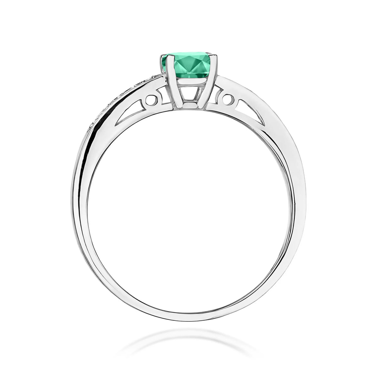 Prsten z bílého 14k zlata s diamanty na ramenou prstenu se smaragdem 0,50 ct a diamanty 0,05 ct