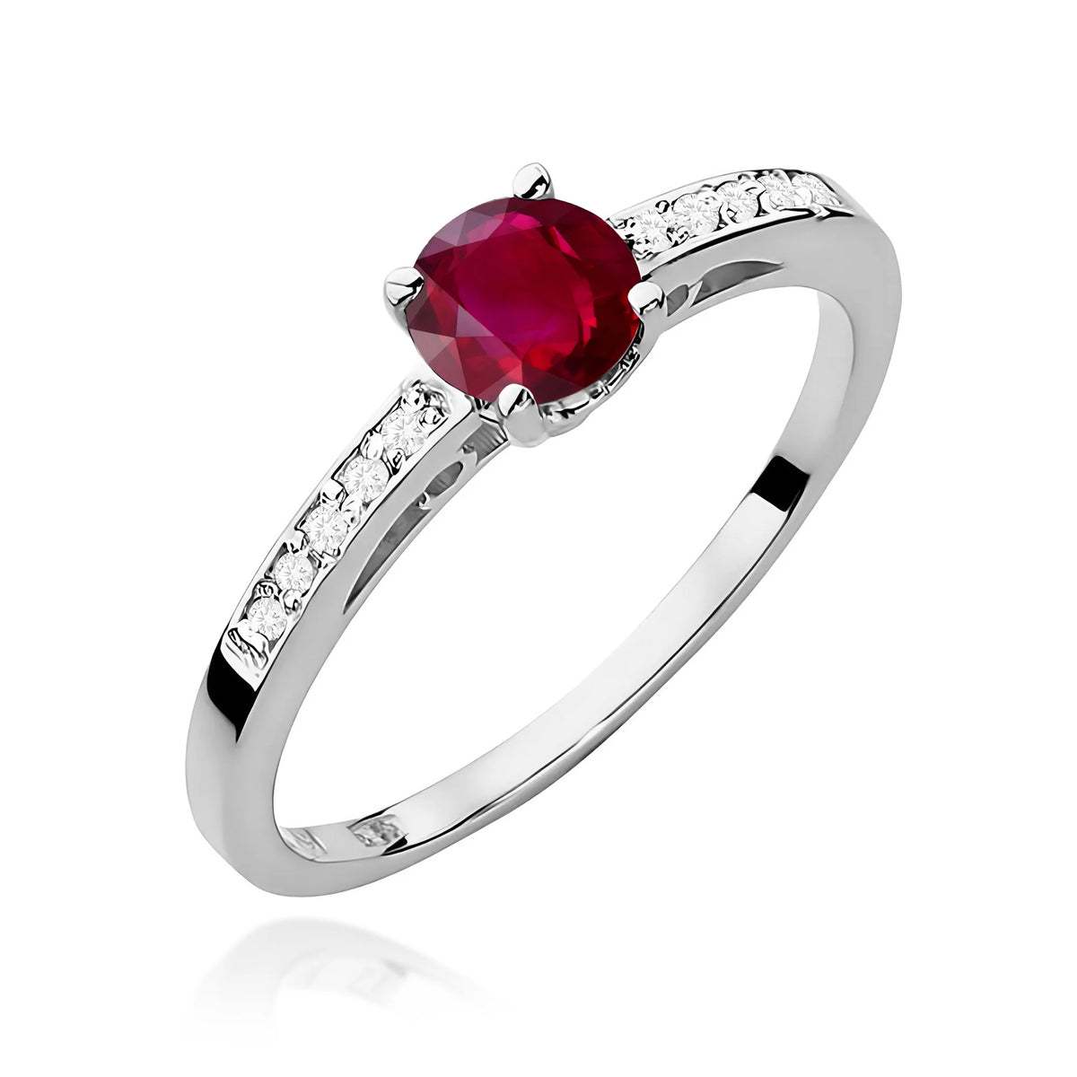 Prsten z bílého zlata s 0,60ct rubínem a 0,05ct diamanty