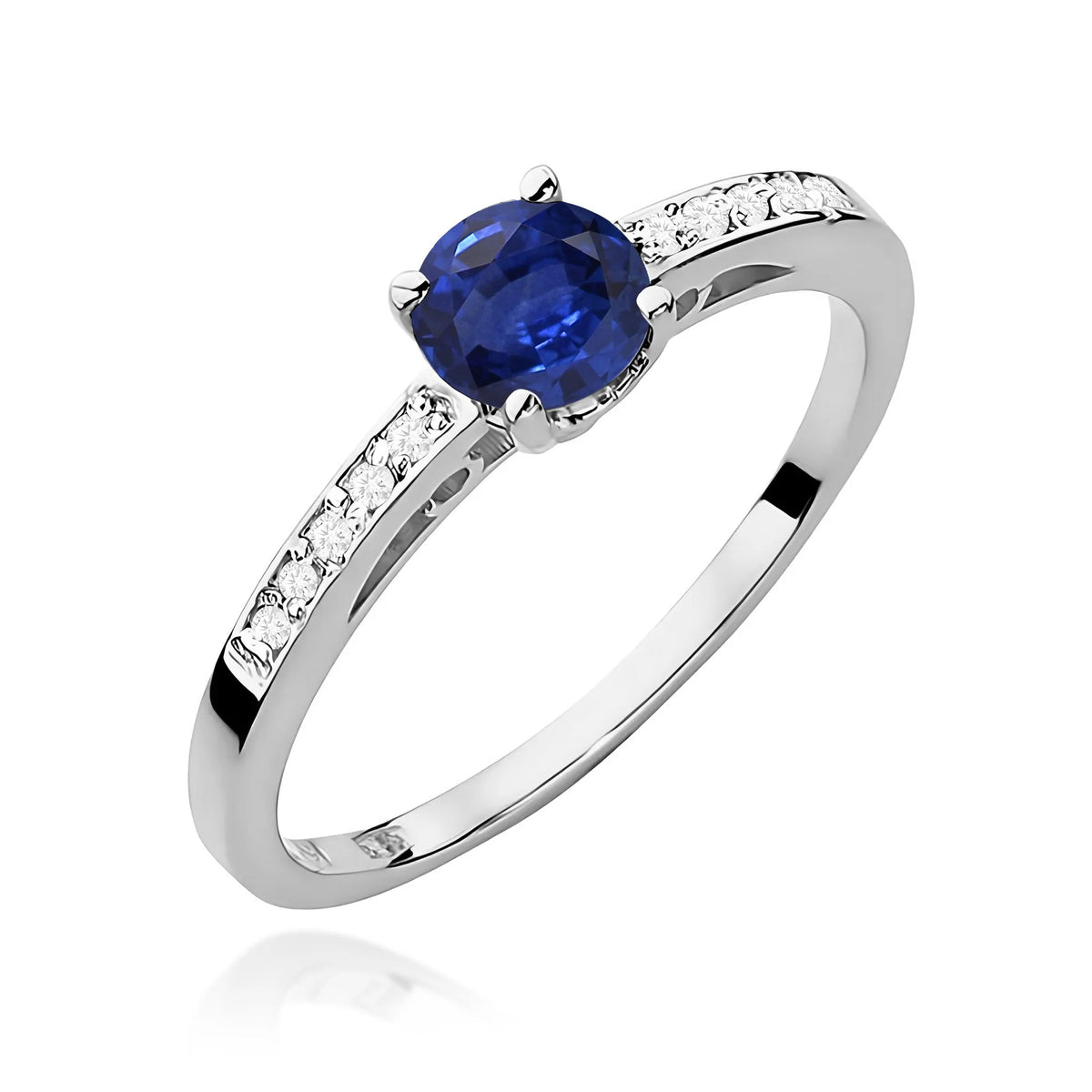 Prsten z bílého zlata s 0,50ct safírem a 0,05ct diamanty