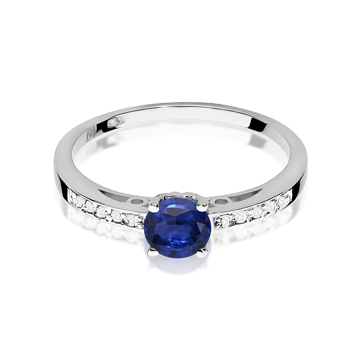 Prsten z bílého zlata s 0,50ct safírem a 0,05ct diamanty