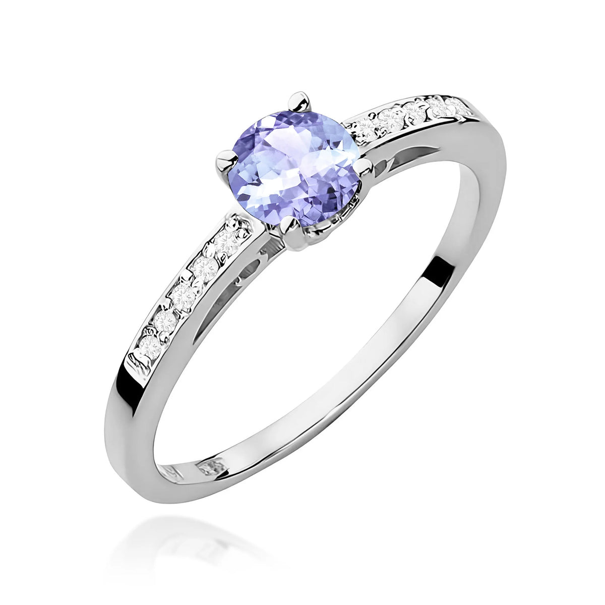 Prsten z bílého 14k zlata s diamanty na ramenou prstenu s tanzanitem 0,50 ct a diamanty 0,05 ct