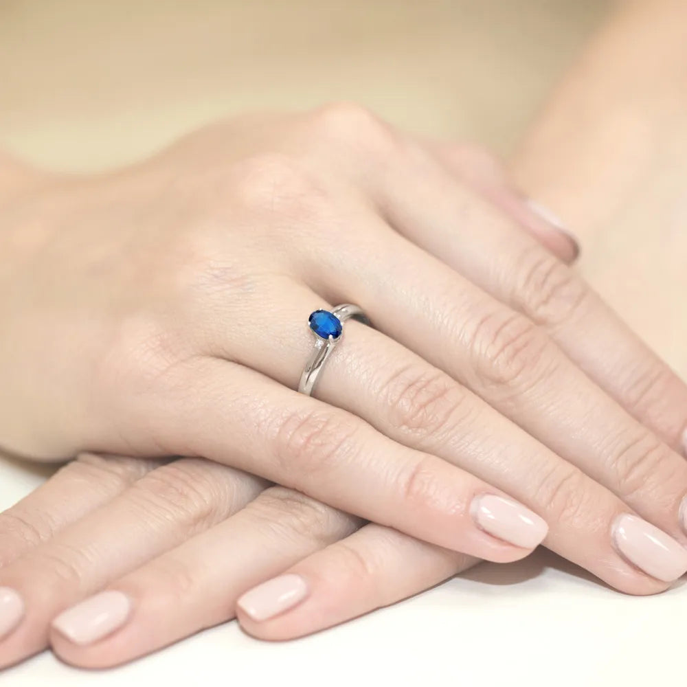 gold-ring-with-0-70ct-sapphire-and-0-029ct-diamonds-w0068-sab-01