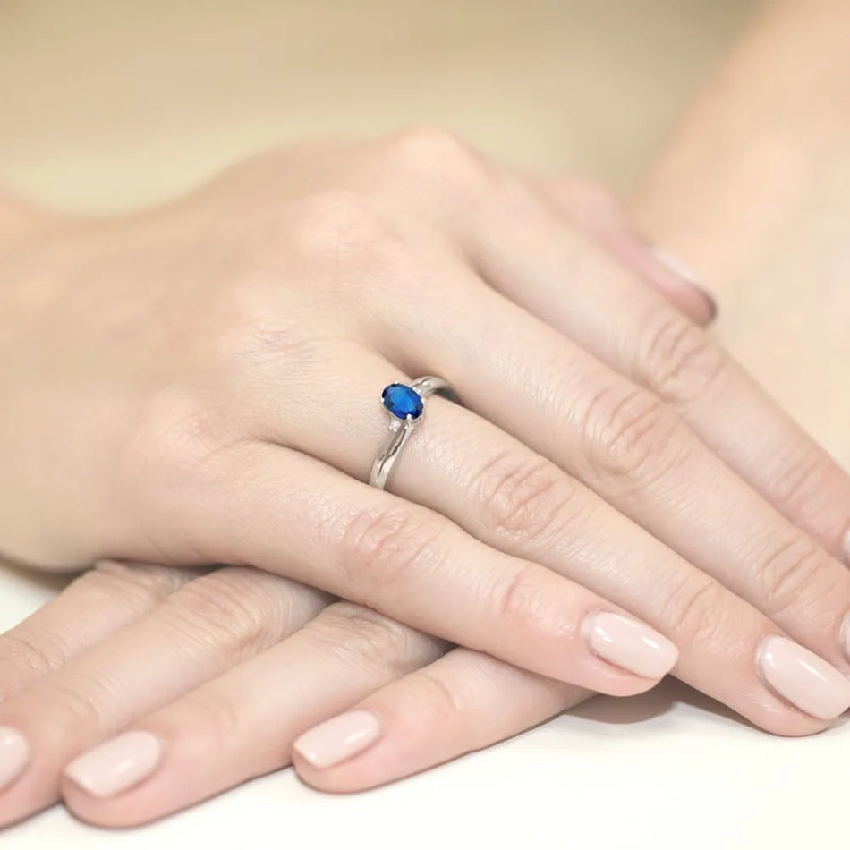 zlatý prsten s 0,70ct safírem a 0,029ct diamanty w0068-sab-01