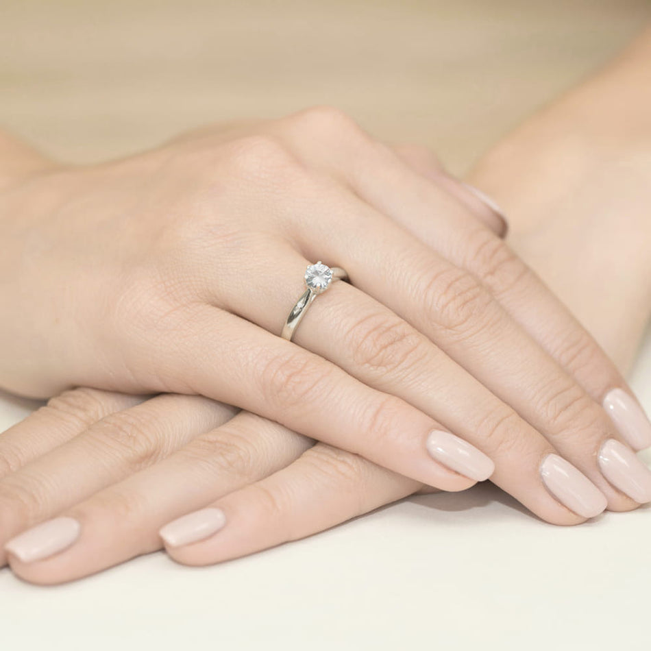 gold-ring-with-0-60ct-white-sapphire-and-0-01ct-diamonds-w0074-saw-01