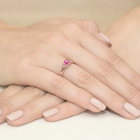 gold-ring-with-0-60ct-pink-topaz-and-diamonds-w0076-top-01