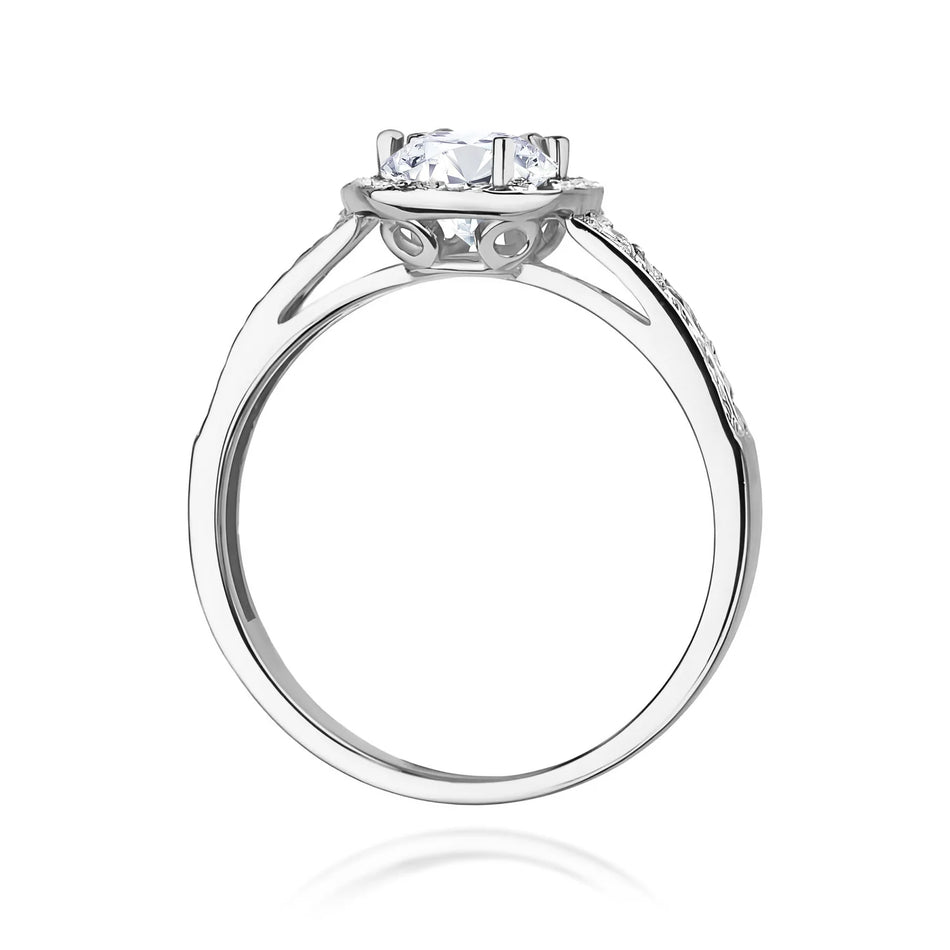 Prsten z bílého zlata s bílým safírem 0,60 ct a diamanty 0,20 ct