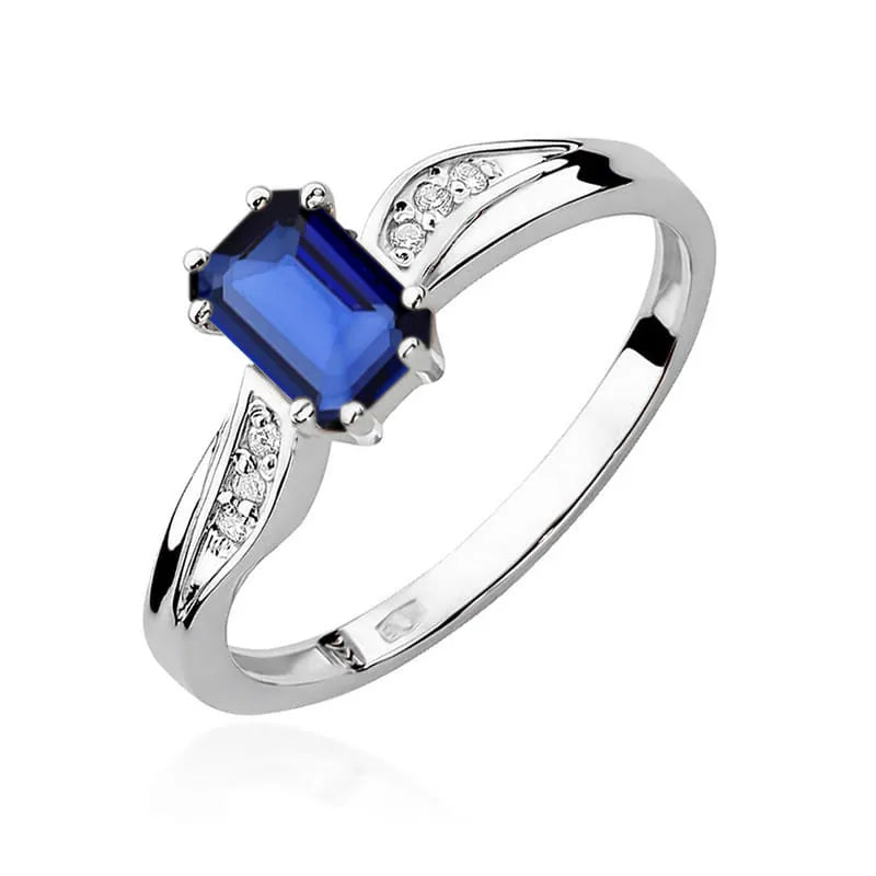 zlatý prsten s 0,60ct safírem a 0,03ct diamanty w0094-sab-01