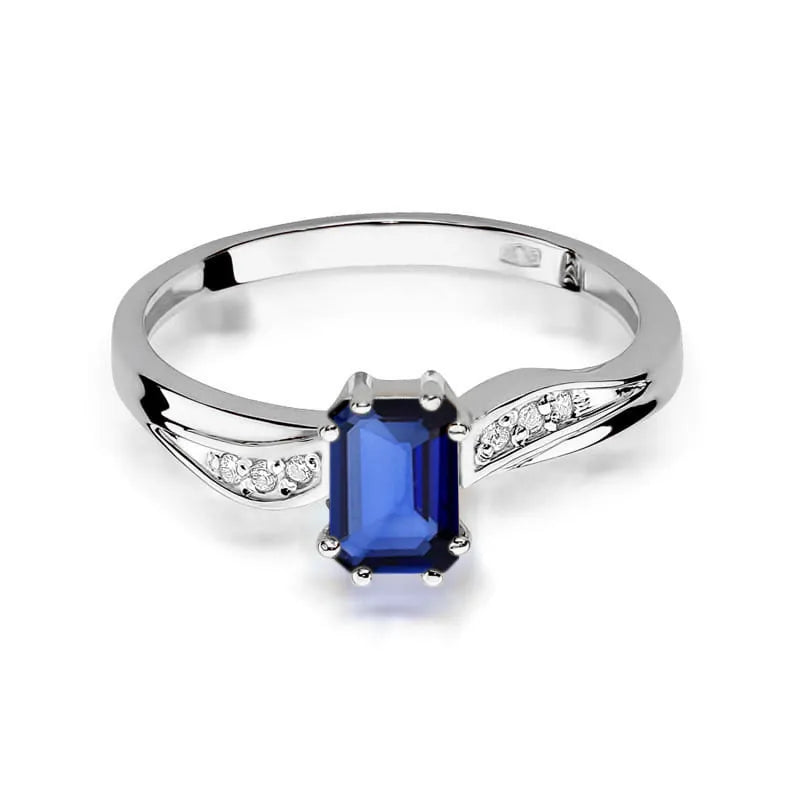 zlatý prsten s 0,60ct safírem a 0,03ct diamanty w0094-sab-01