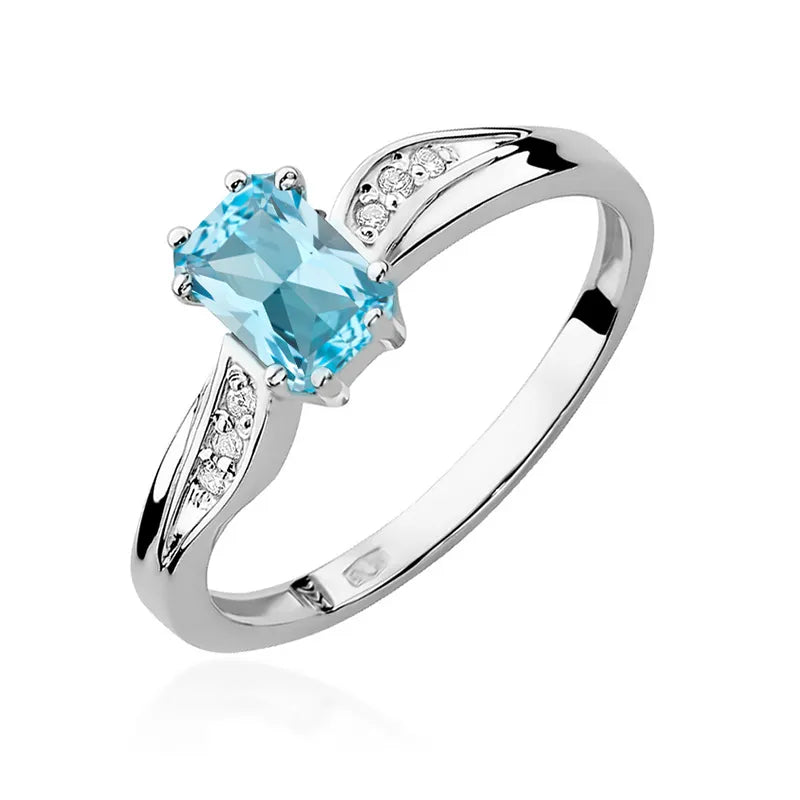 zlatý prsten s topazem 0,65 ct a diamanty 0,03 ct w0094-tob-01