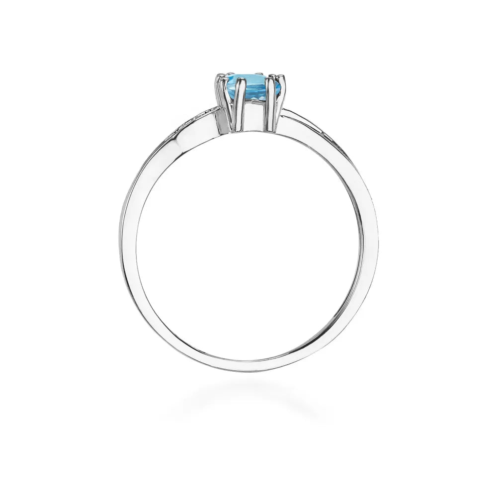 zlatý prsten s topazem 0,65 ct a diamanty 0,03 ct w0094-tob-01